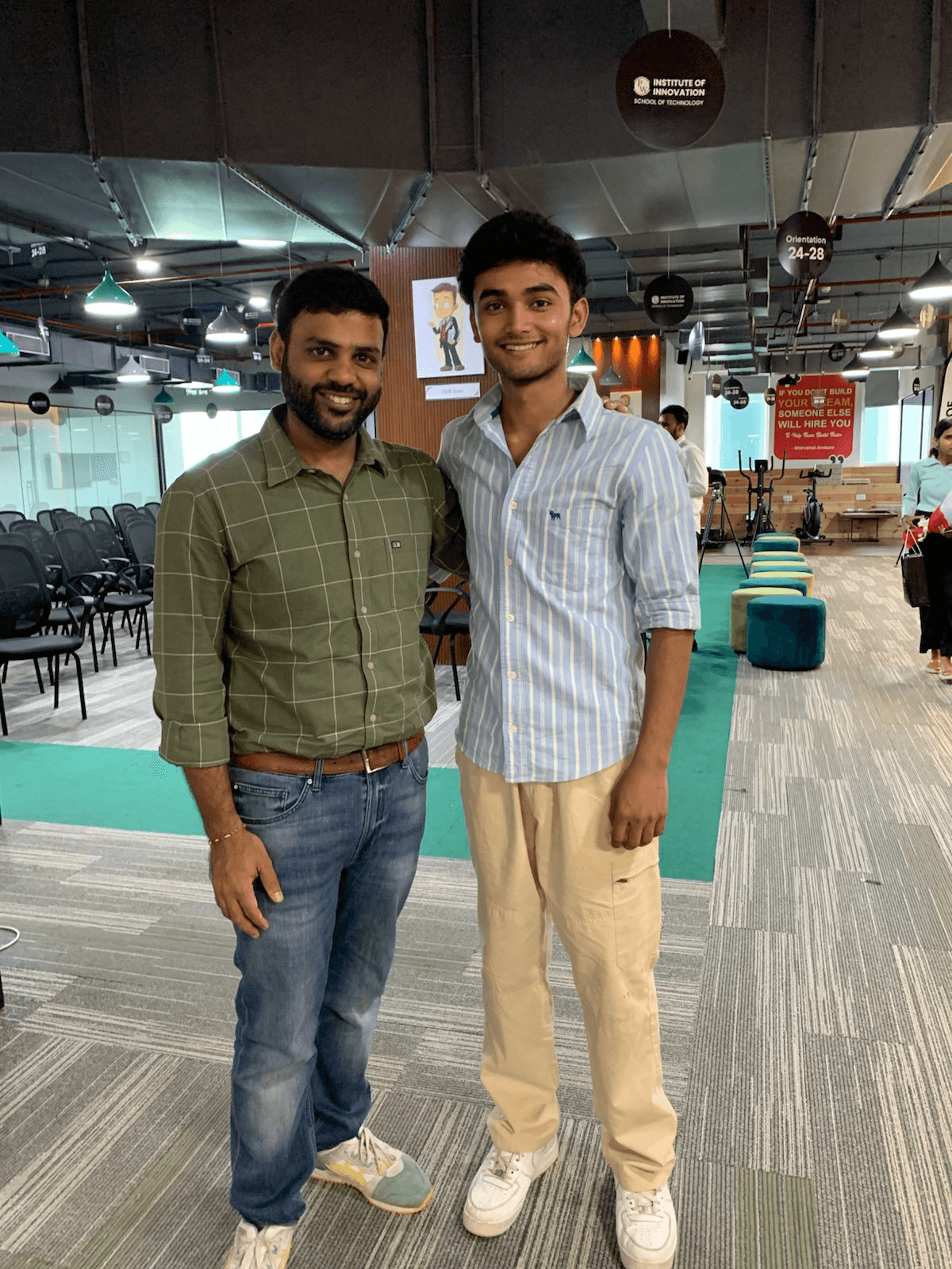 Two people at a community workspace
